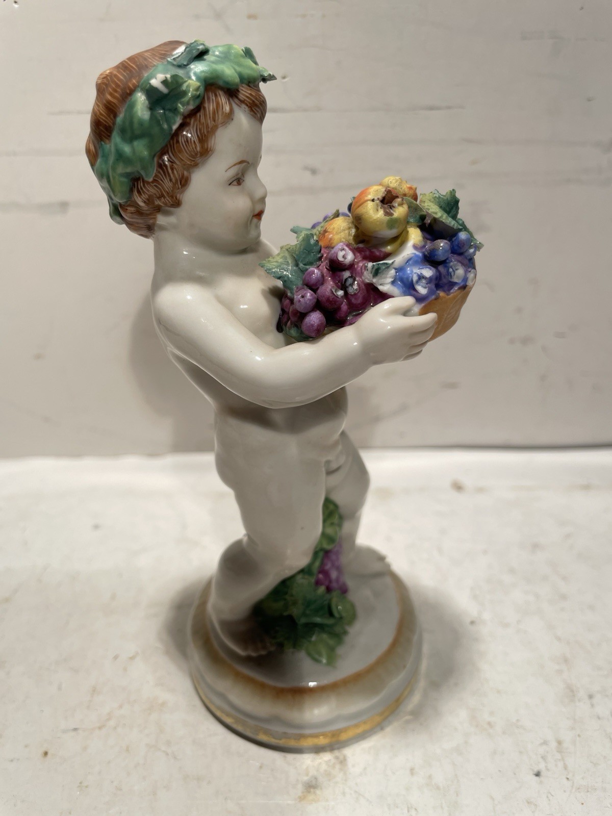 Antique Muller Volkstedt Porcelain Cherub Figurine Holding Fruit Basket J