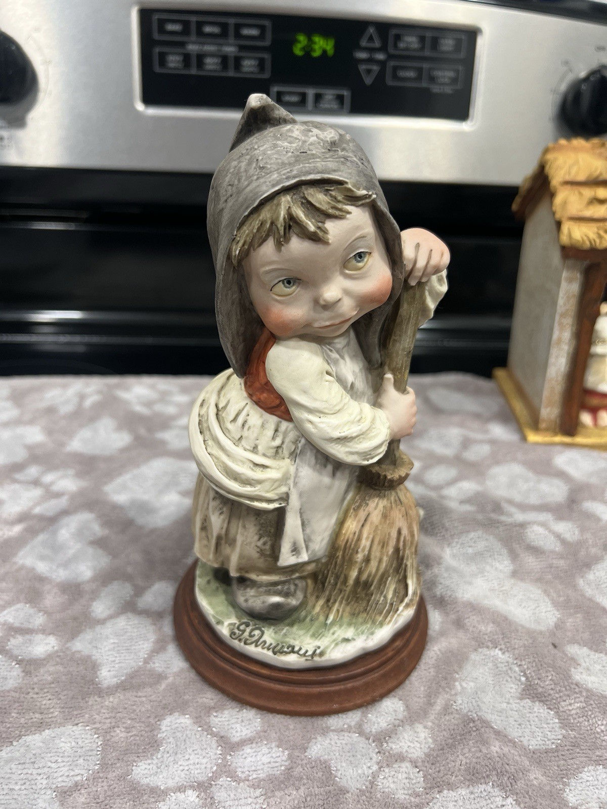 Painted Resin Girl Figurine Gray Hooded Cloak on Brown Base, 1pc