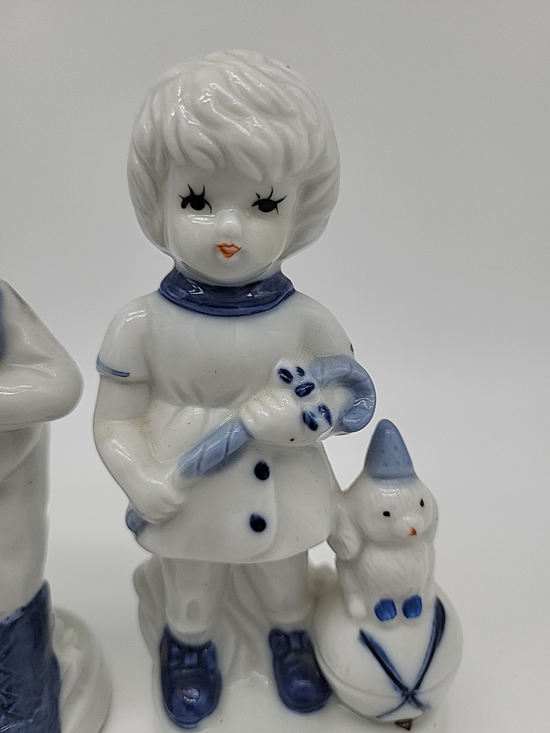 Vtg Delft Blue Dutch Girl Boy Child Showing Cat Bear Holland Porcelain Figurines