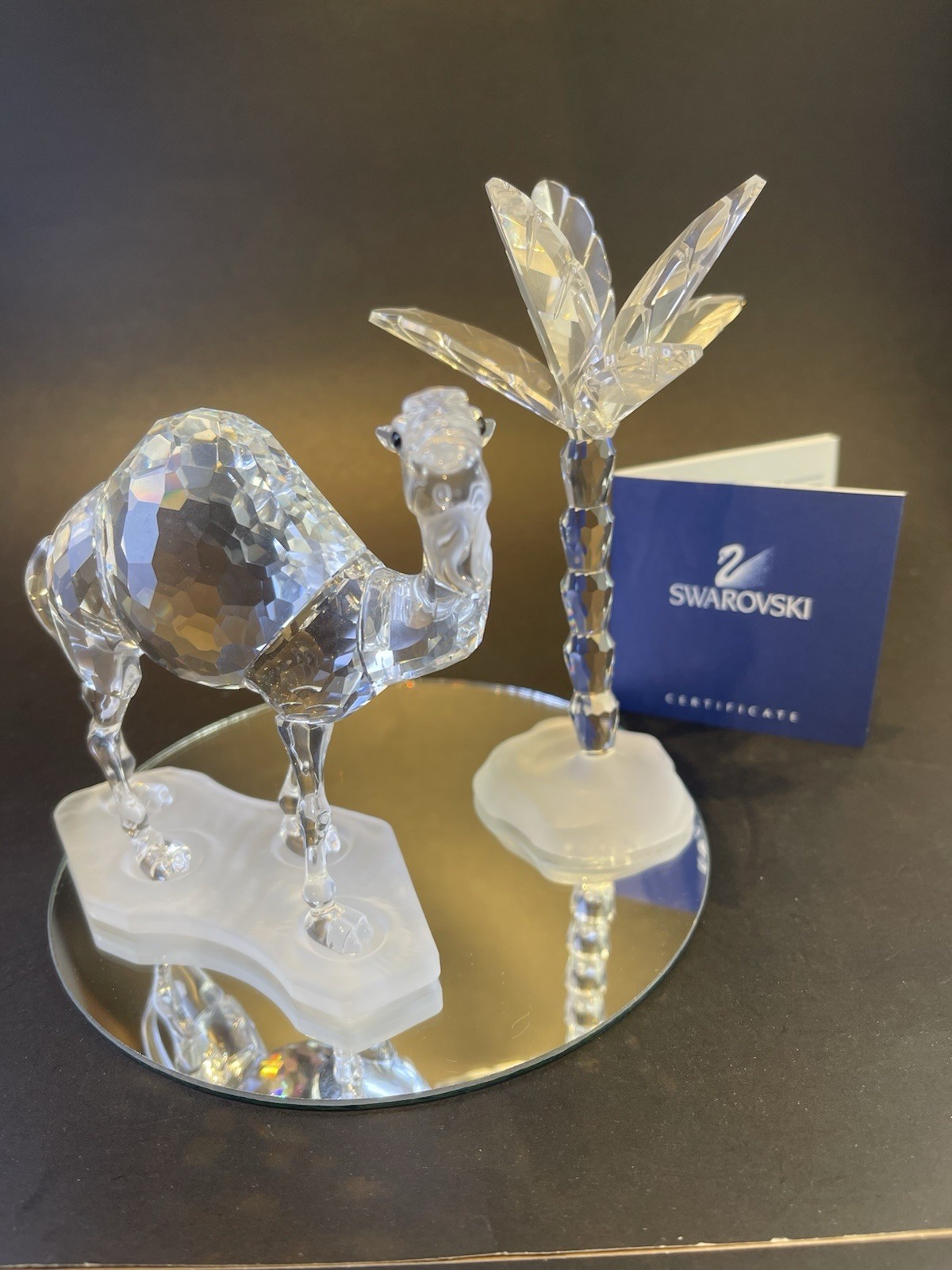swarovski,stately camel and palm tree,boxes, certifs,mint