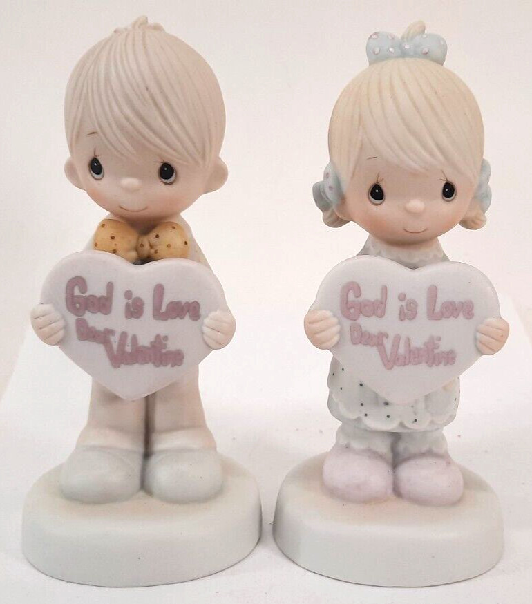 Set Of 2 Precious Moments E-7153 & E-7154 Boy/Girl Holding Heart 1981 Figurines