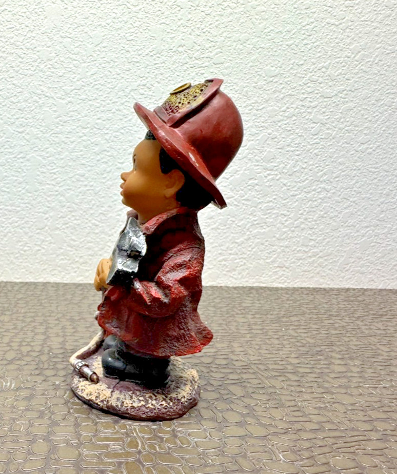 Firefighter Young Boy Figurine, Resin *