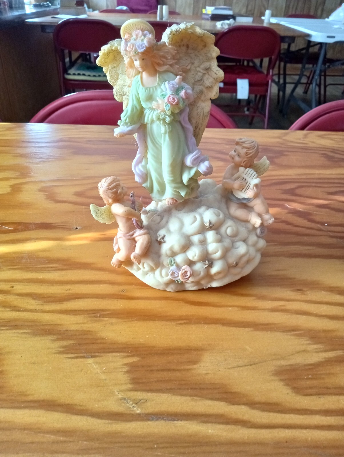 Angel with two cherubs music figurine