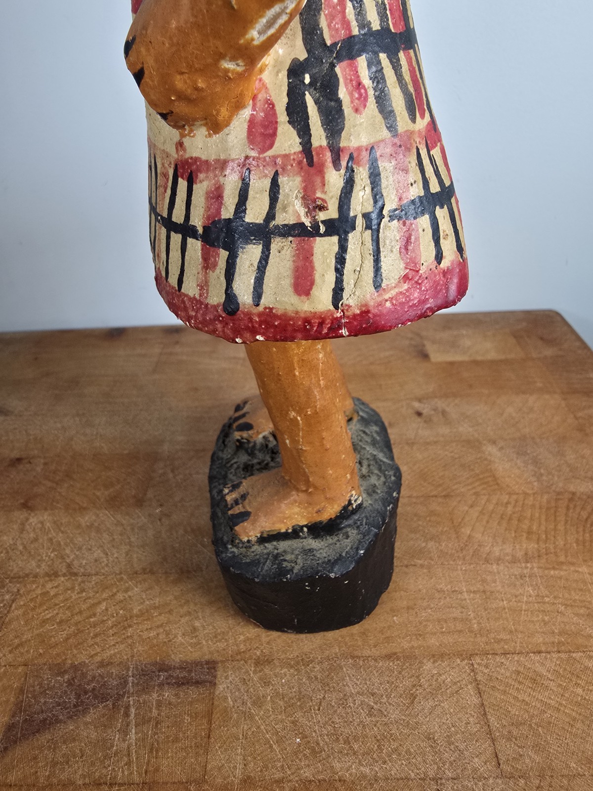 Folk art carved wood figure masked