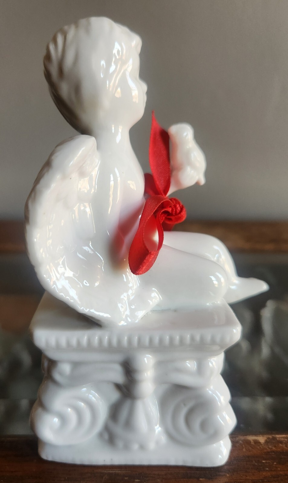 White Ceramic Cherub Angel Boy Figure Sitting On A Colum • 5″ Tall