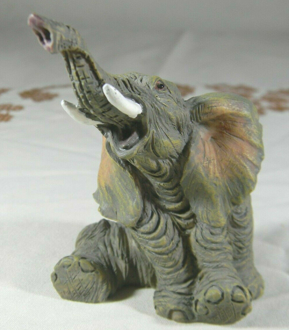 Tuskers Small Sitting Elephant Resin Figurine Used VG Condition Free Shipping