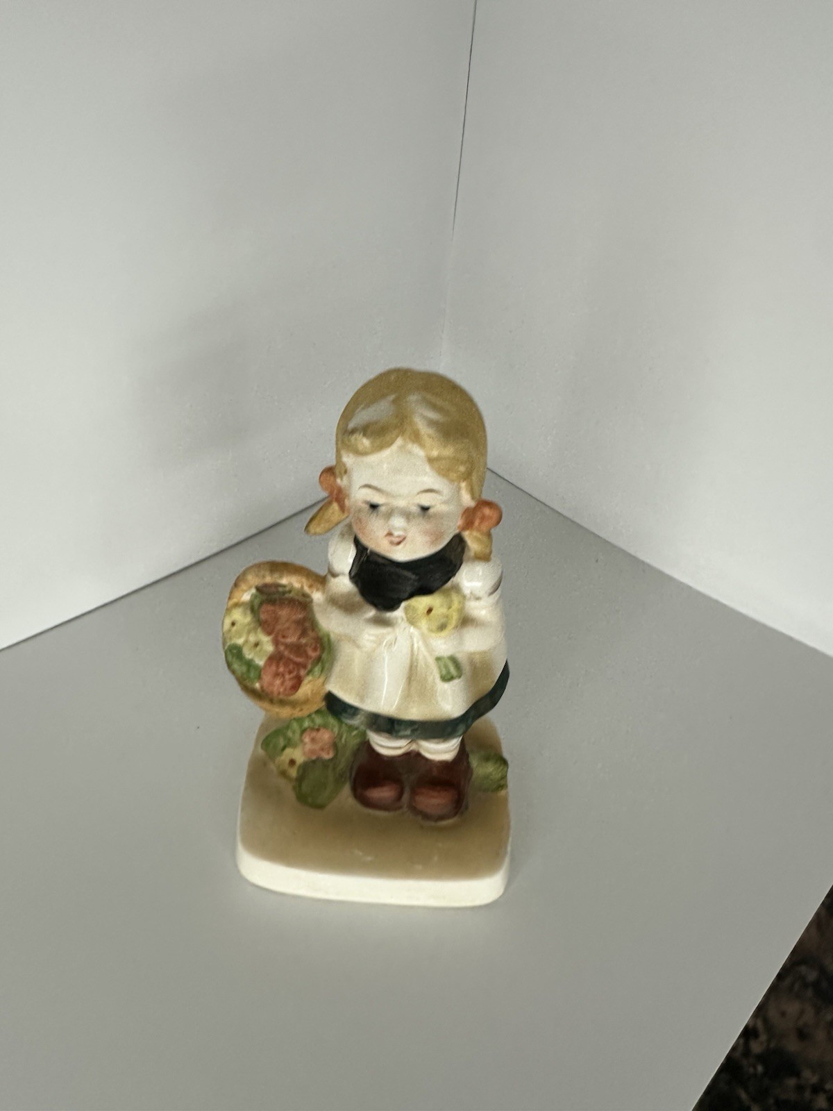 Hand Painted Ceramic Girl Figurine with Basket, Beige Green Brown Matte Finish