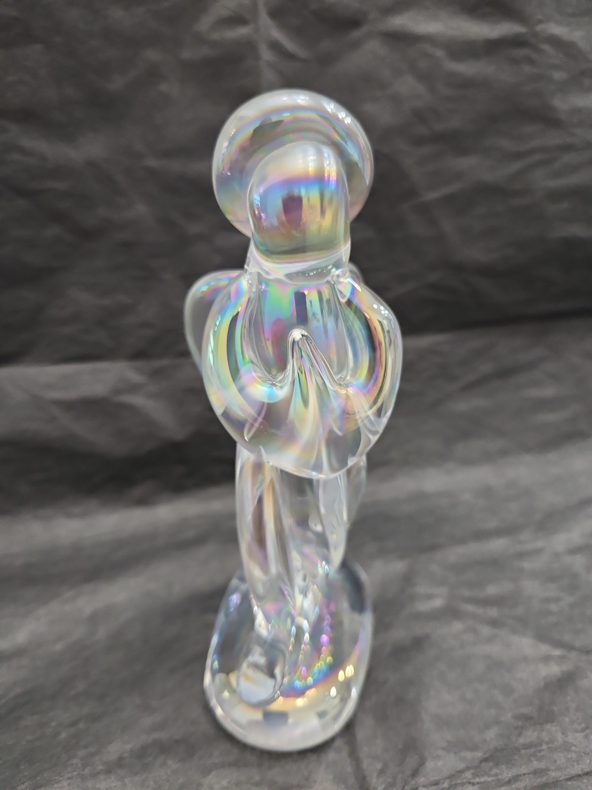 Praying Angel with a rainbow-like sheen commonly described as iridescent