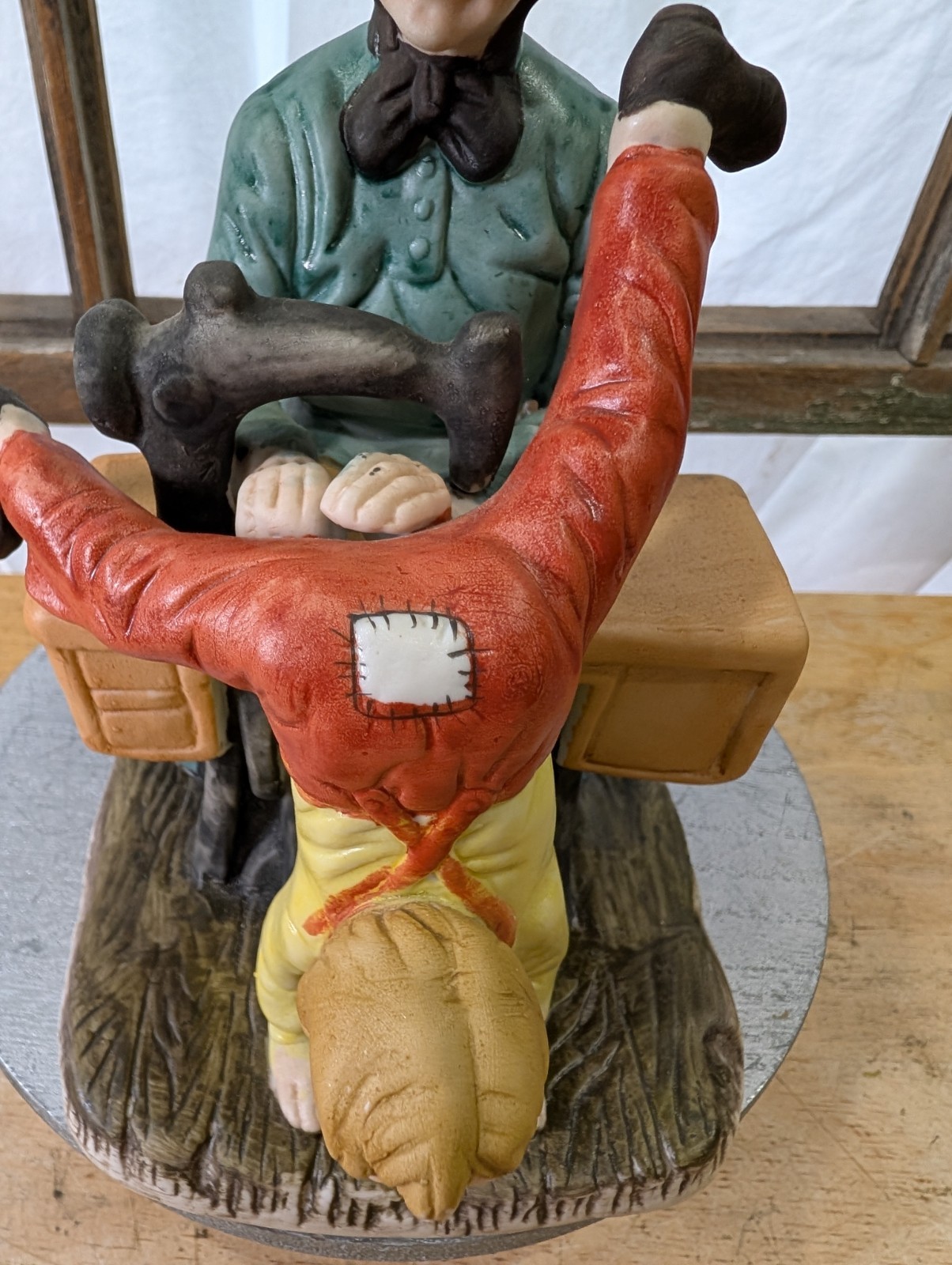 CERAMIC GRANDMA SEWING YOUNG BOY’S PANTS