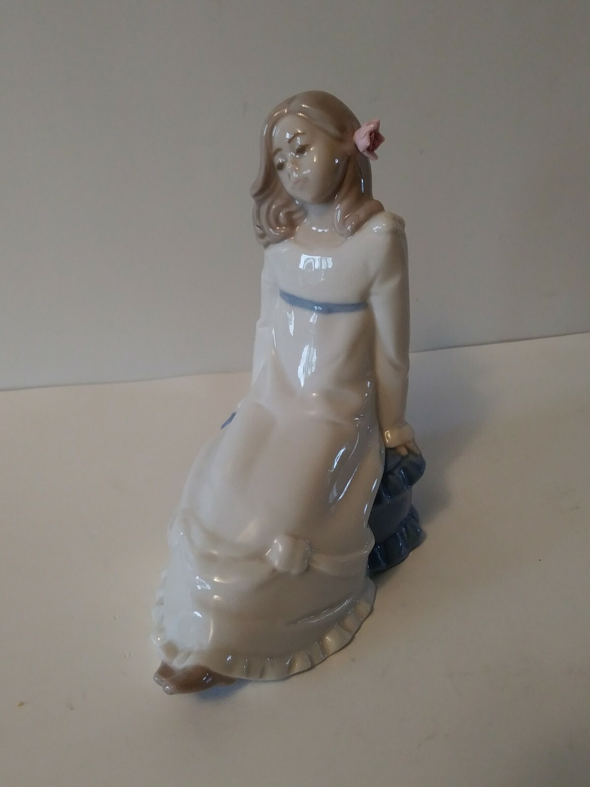Enrique Nadal Porcelain Girl Sitting on a Cushion Figurine 1987 Excellent shape.