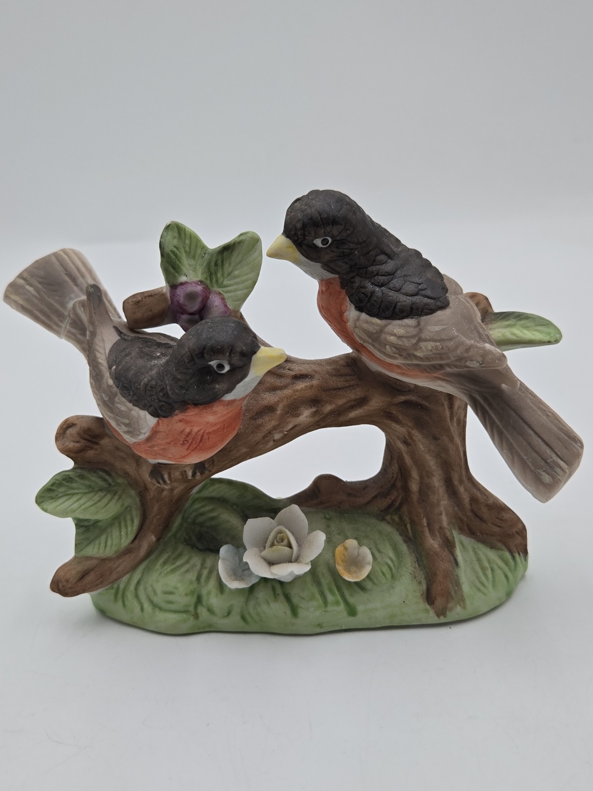 Vintage Lefton Robins on branch with flowers.