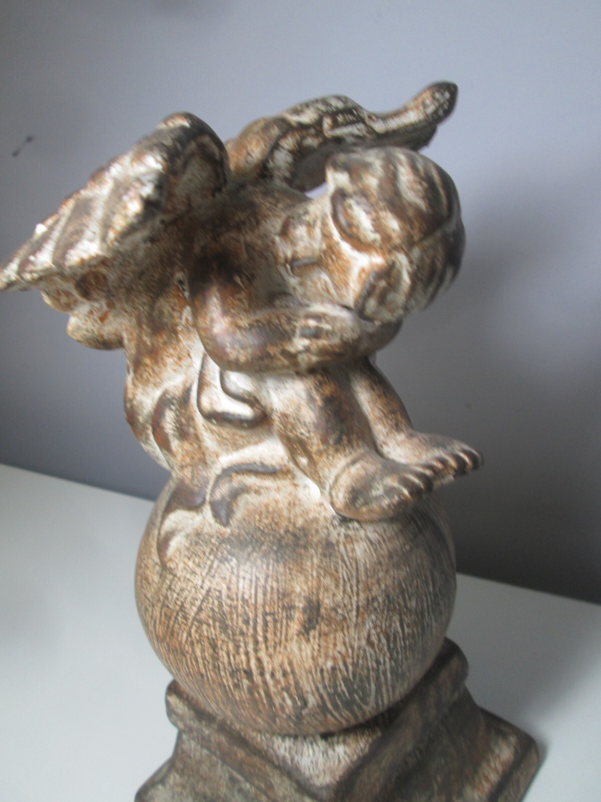 Ceramic Cherub on a Globe inside or outside Décor