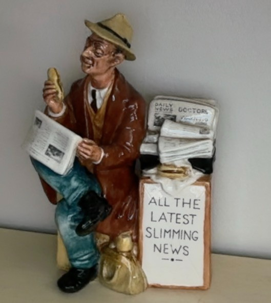 Vintage Royal Doulton Porcelain Figurine “Stop Press”. HN 2683. 8″ Tall.