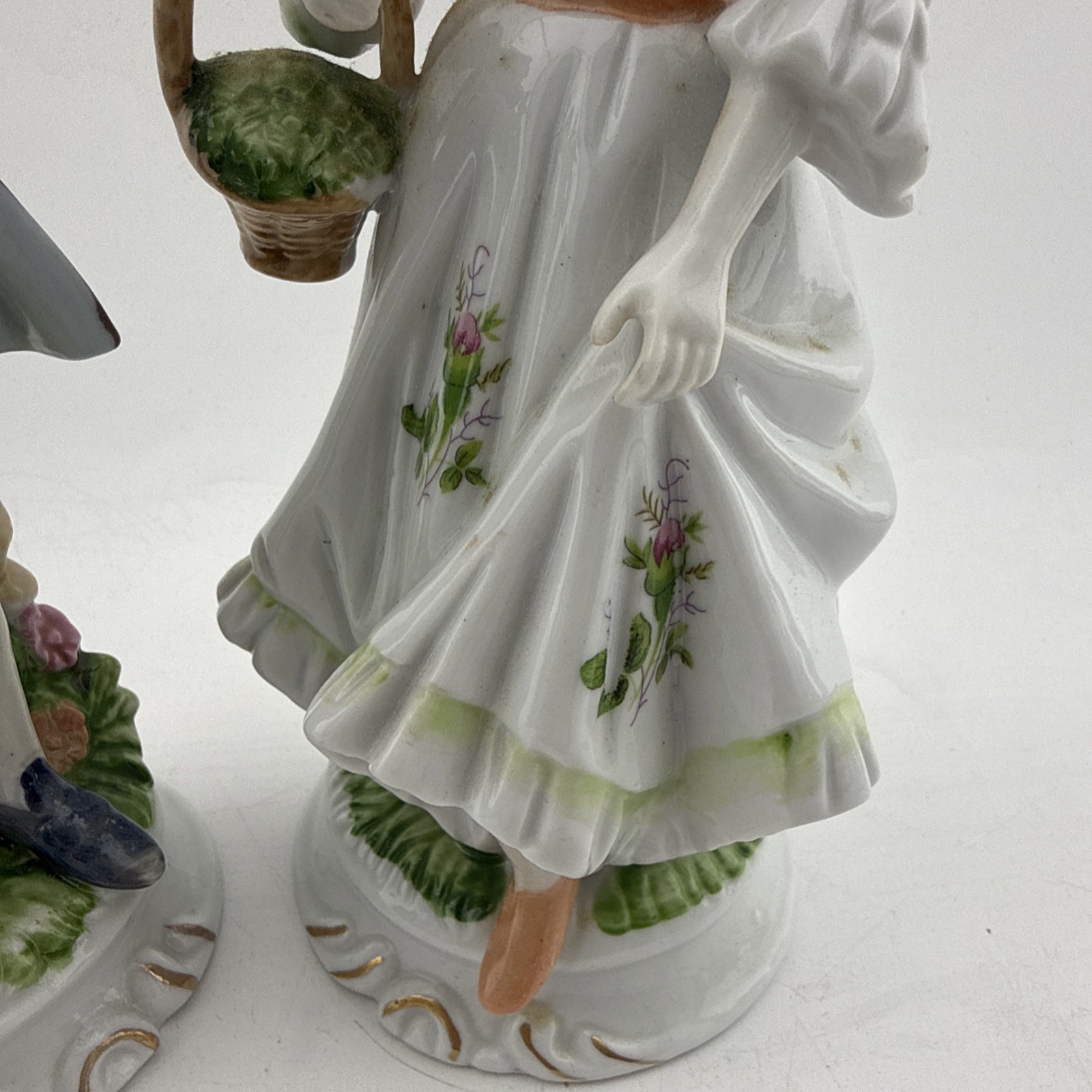 Vintage Colonial Porcelain Couple Figurines Man Bird Woman Basket