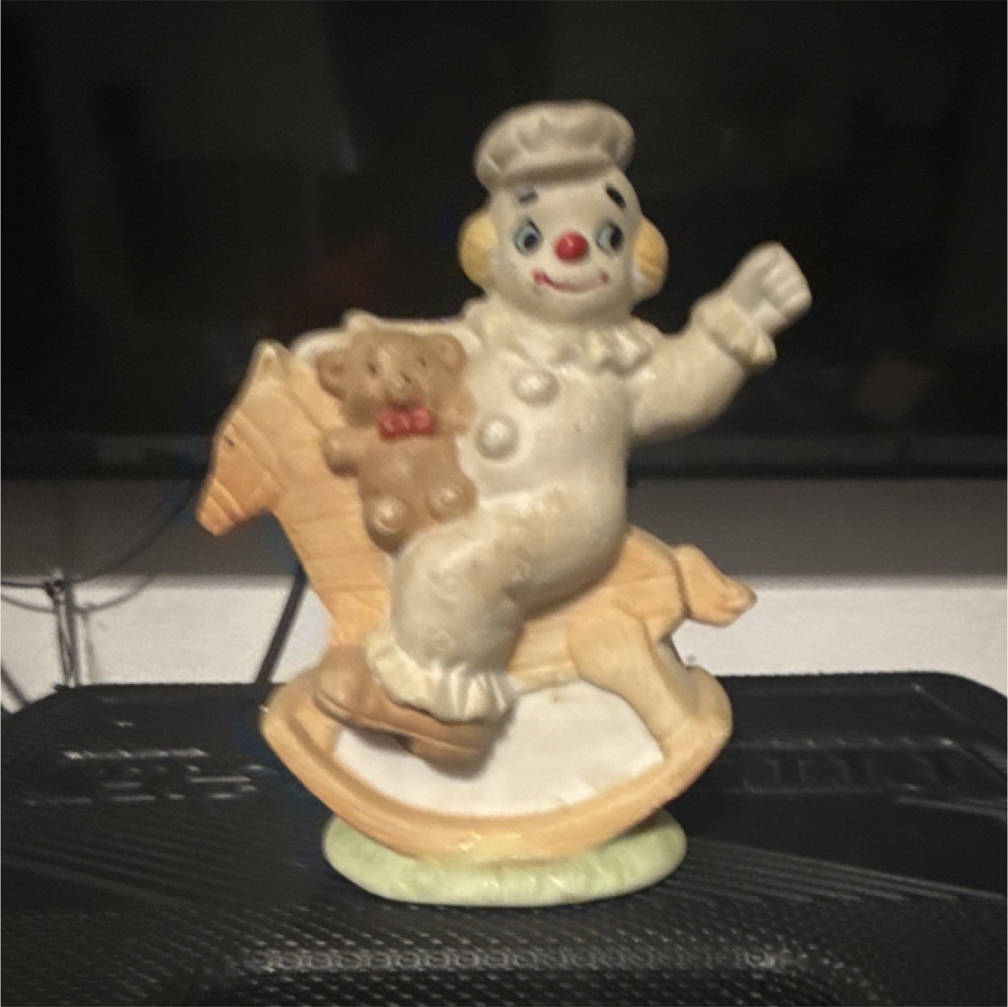 Painted Ceramic Clown Figurine on Rocking Horse with Teddy Bear