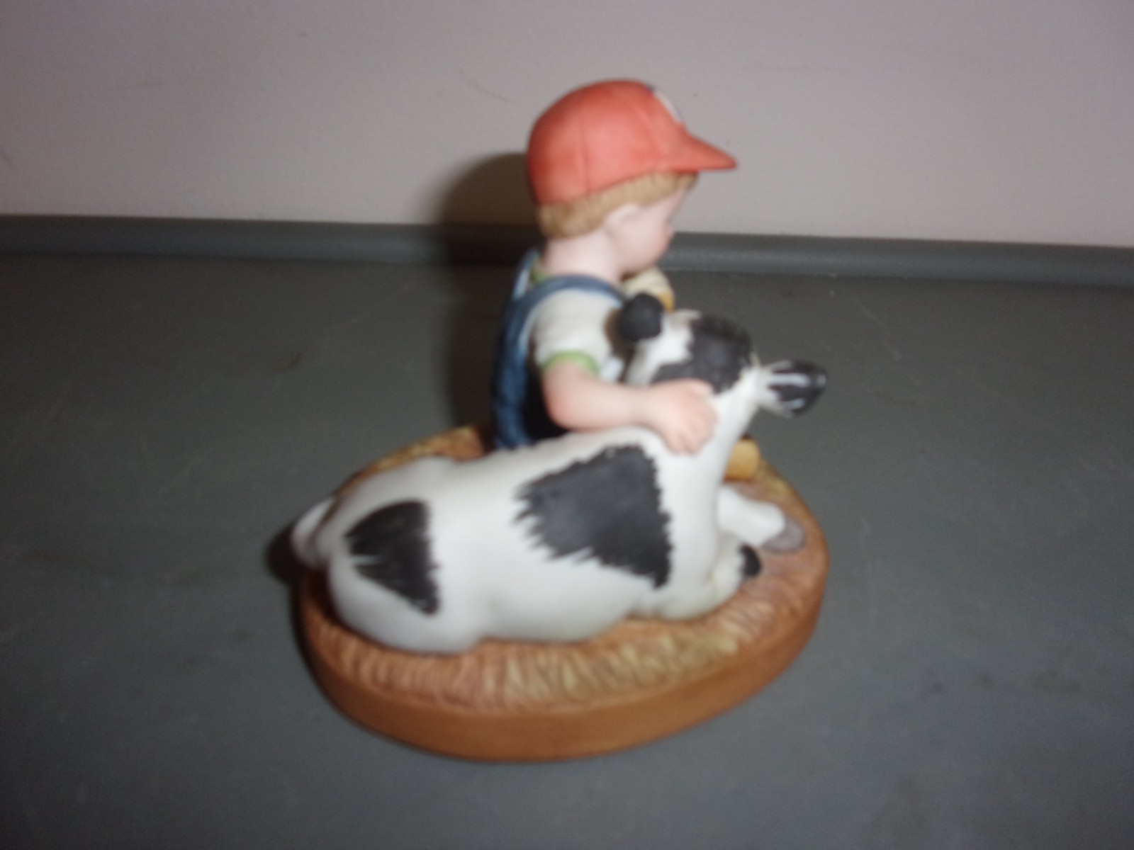 BOY BOTTLE FEEDING CALF COUNTRY STORE LITTLE FARMERS LIMITED EDITION FIGURINE