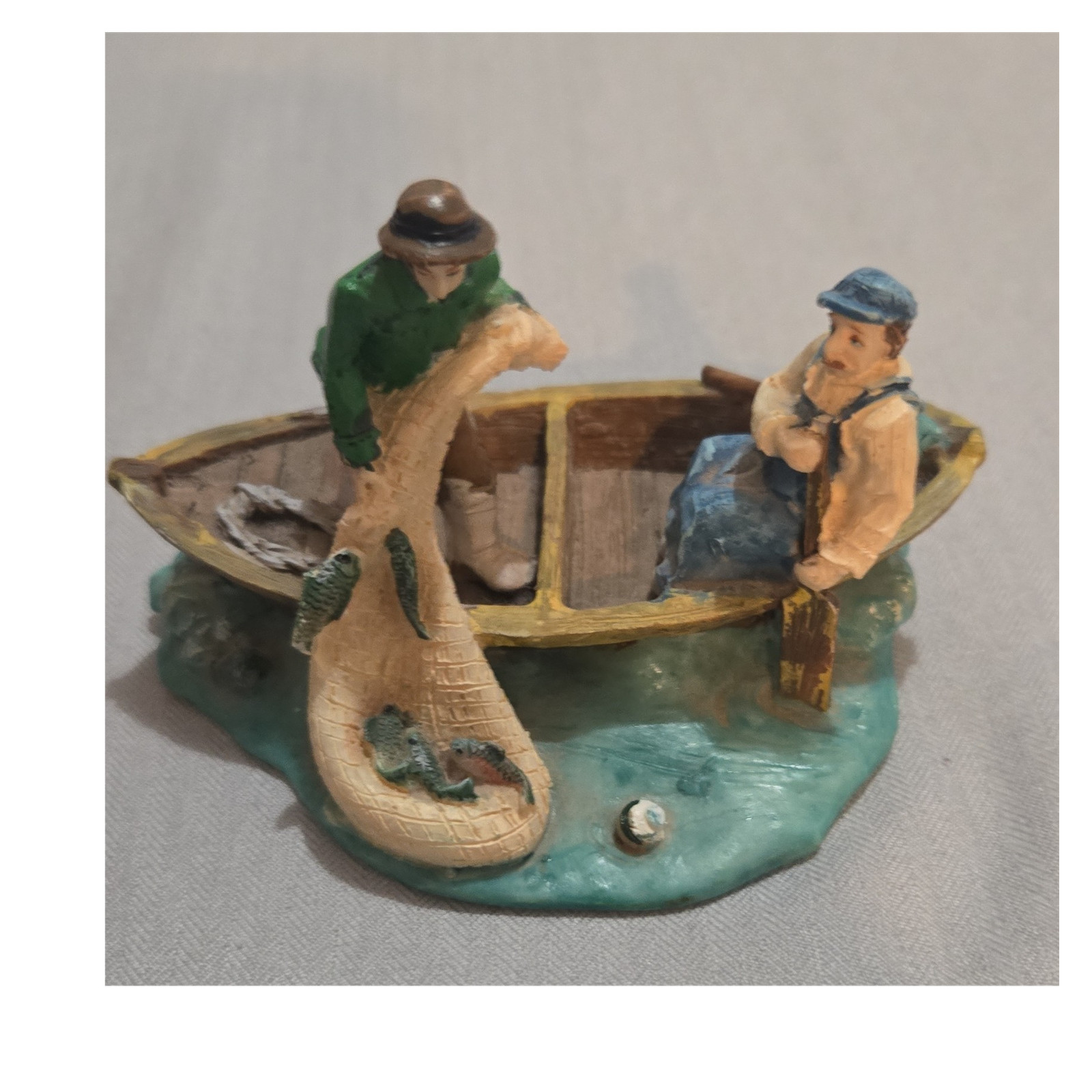 Hand Painted Resin Fishing Boat Figurine with Two People Multicolor Sculpture