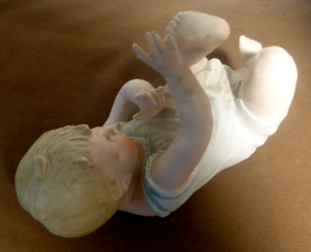 Vintage Heubach Bisque Reclining 8″ Piano Baby Figurine No.3102