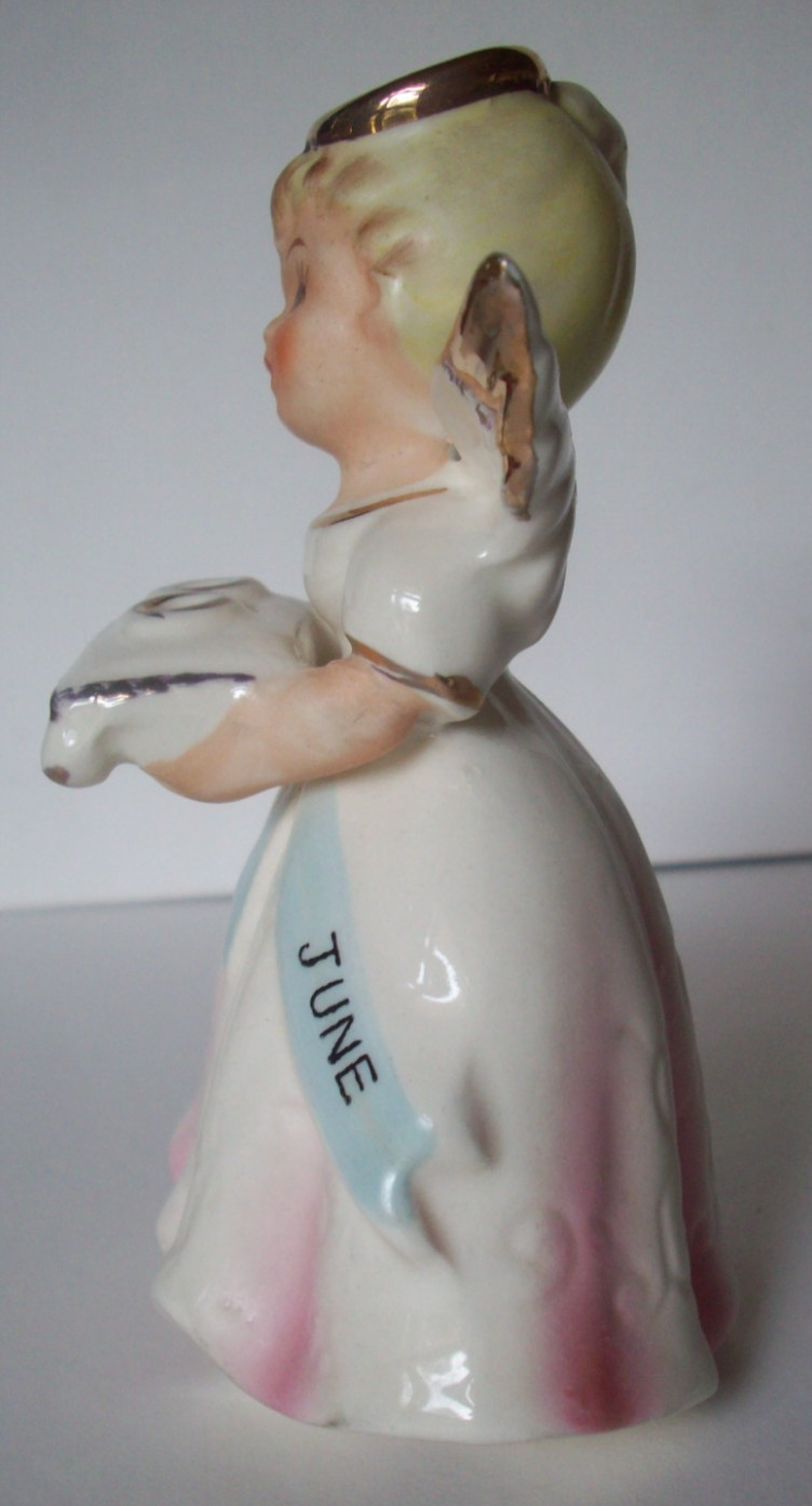 June Angel holding wedding bands rings porcelain angel figurine