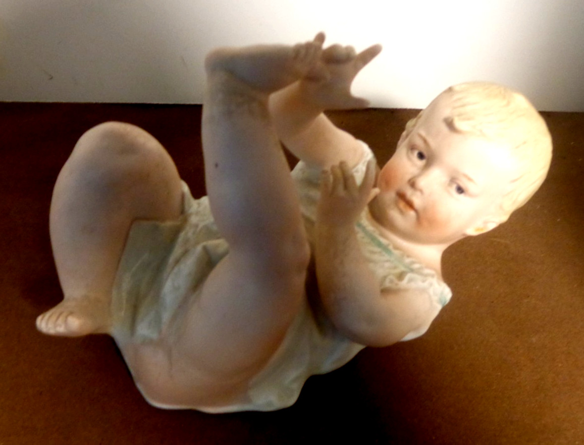 Vintage Heubach Bisque Reclining 8″ Piano Baby Figurine No.3102