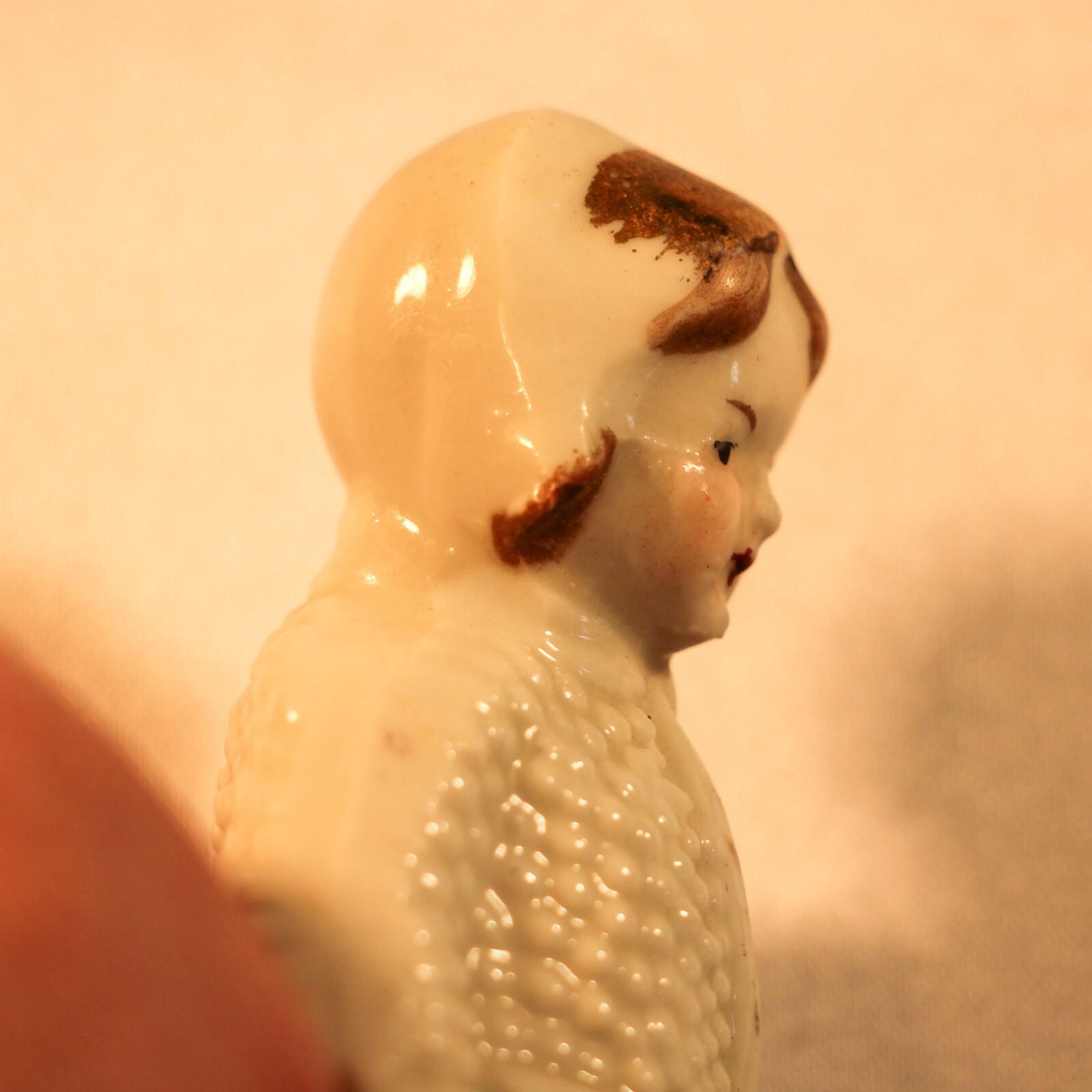 vintage Girl in knit coat porcelain figurine 3.75″ Germany