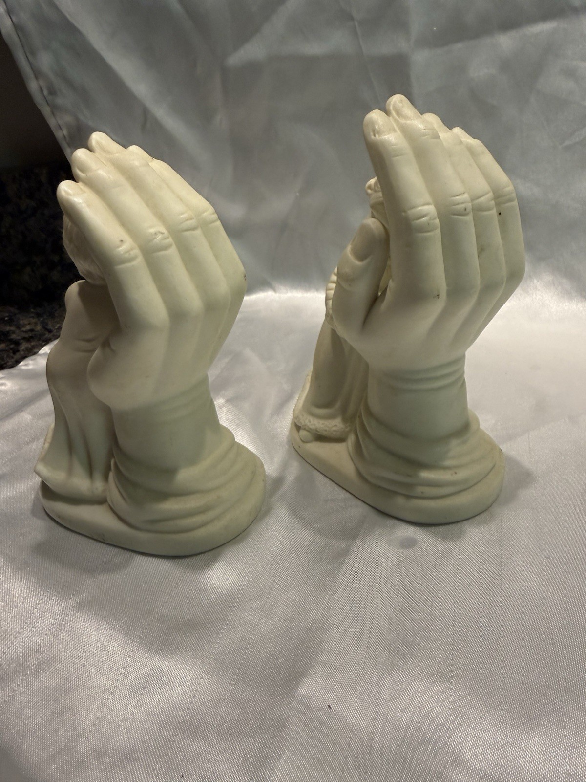 White Ceramic Angel Figurines Pair Praying Hands Holding Child 3D Effect
