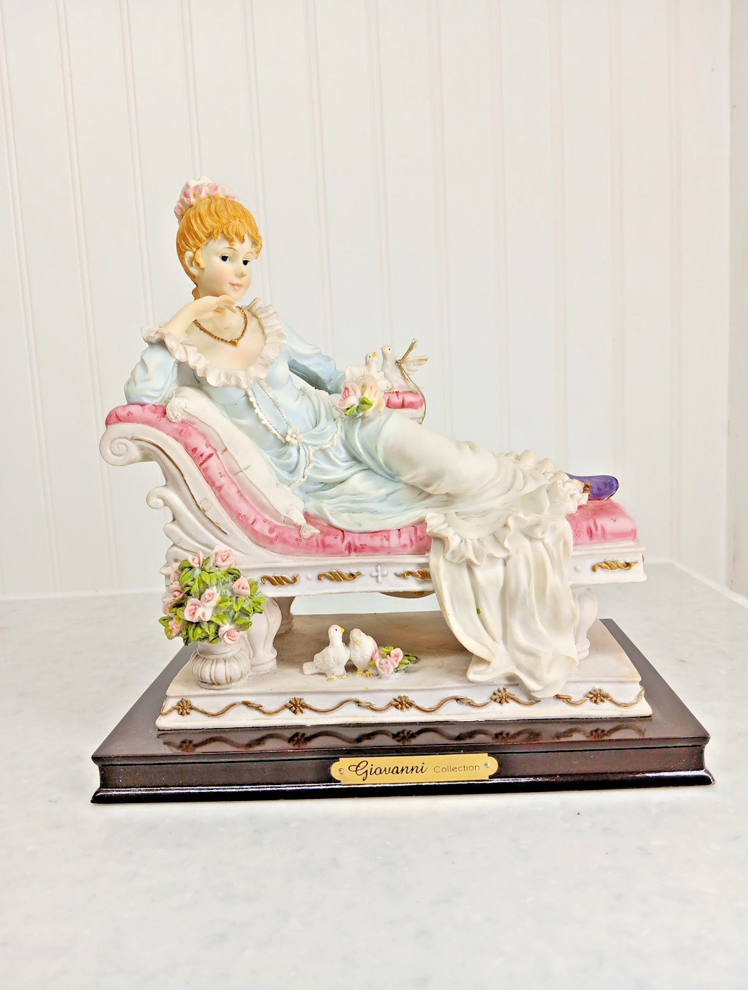Giovanni Collection Woman lounging on couch. Vintage figurine.9″