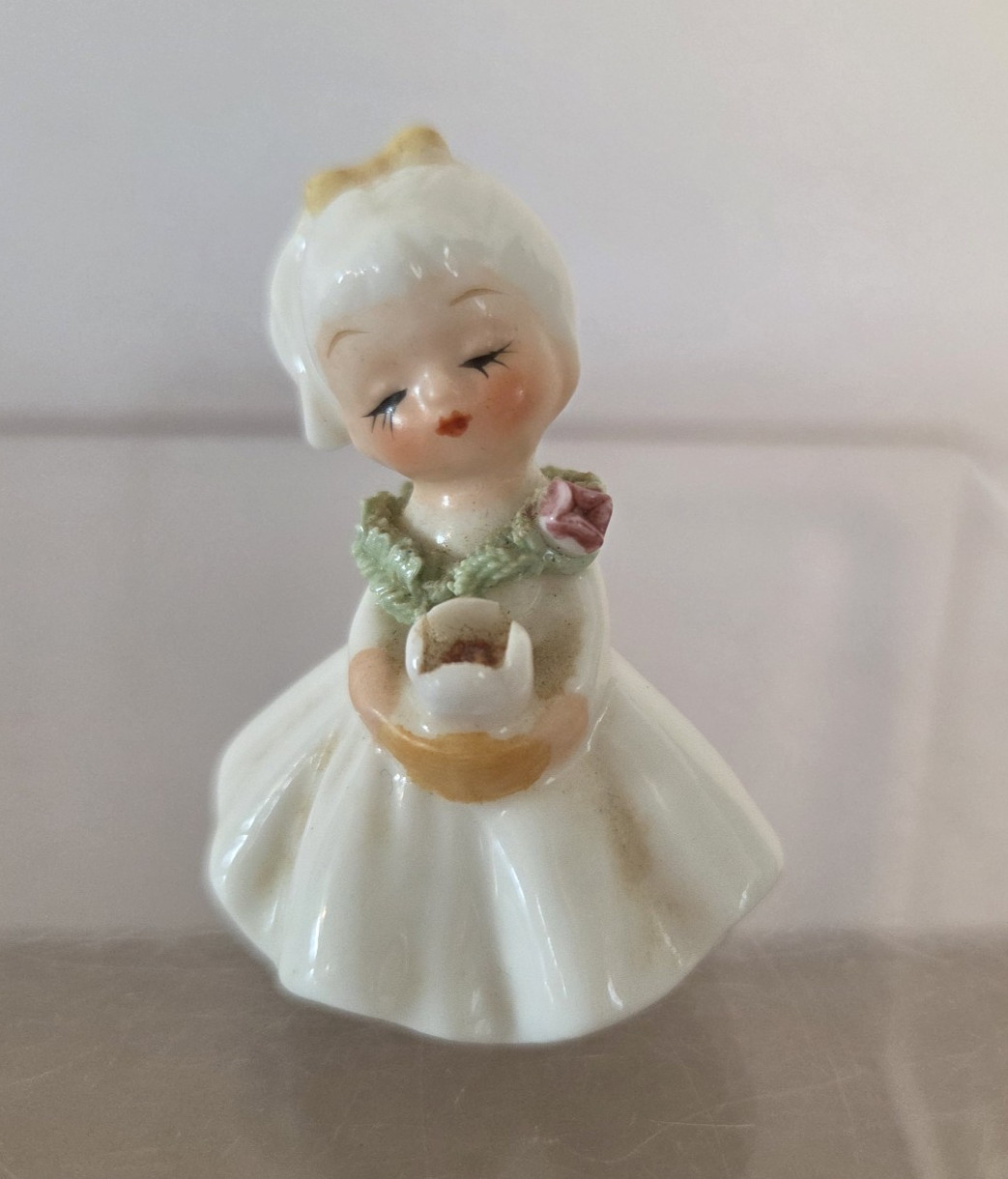 VINTAGE NAPCO MINIATURE BONE CHINA FLOWER GIRL WITH SPAGHETTI TRIM 2.5 in