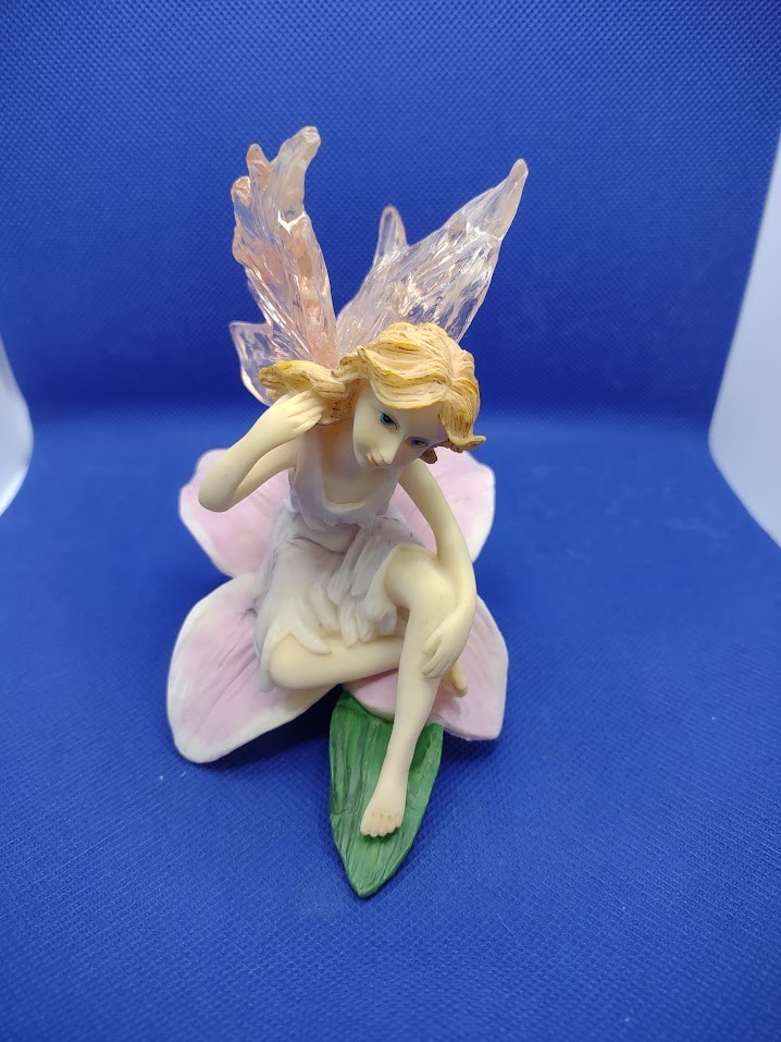 Fairy sitting and waiting. Perfect condition.