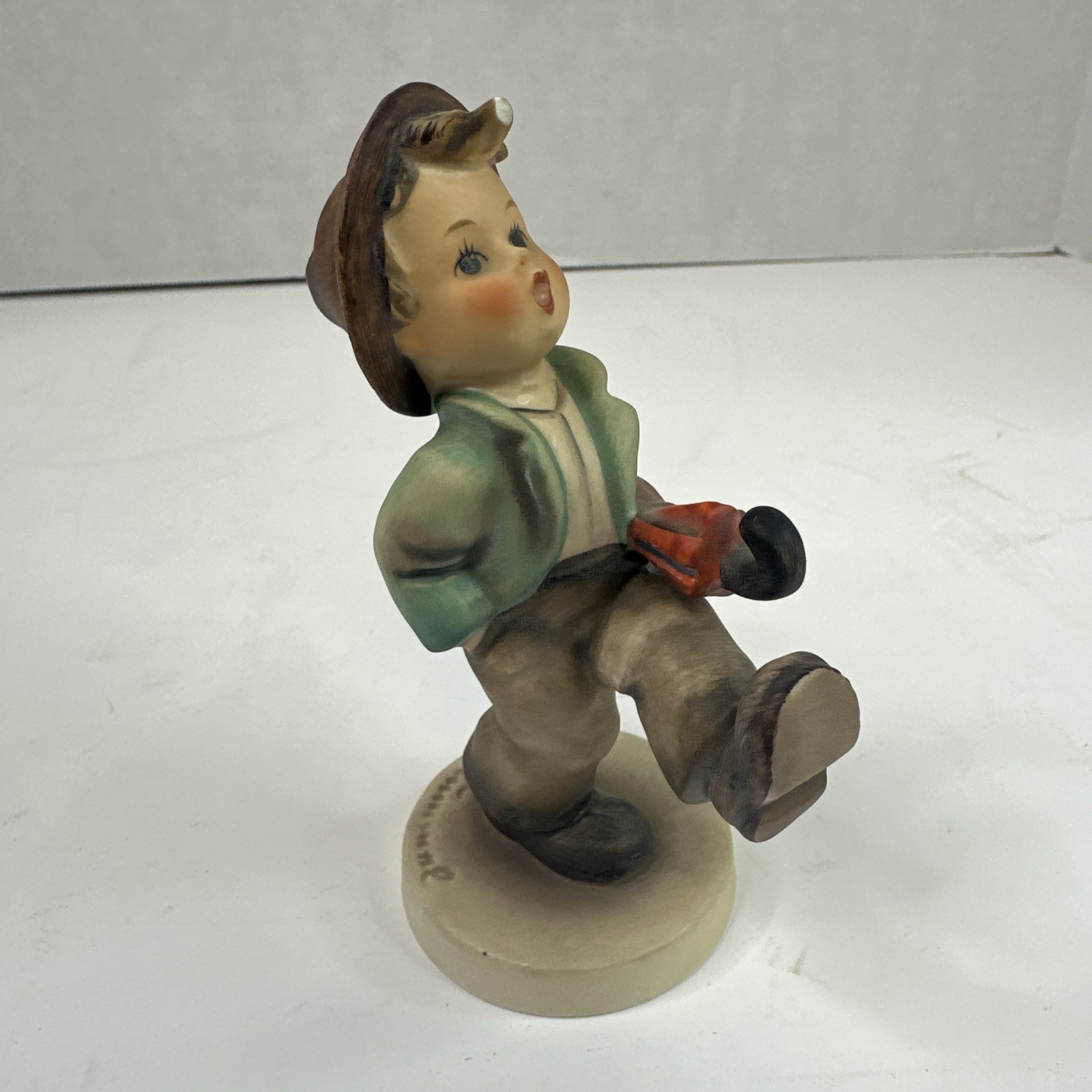 M.J. Hummel Goebel Happy Traveler 109/0 W Germany 5″ Boy with Umbrella
