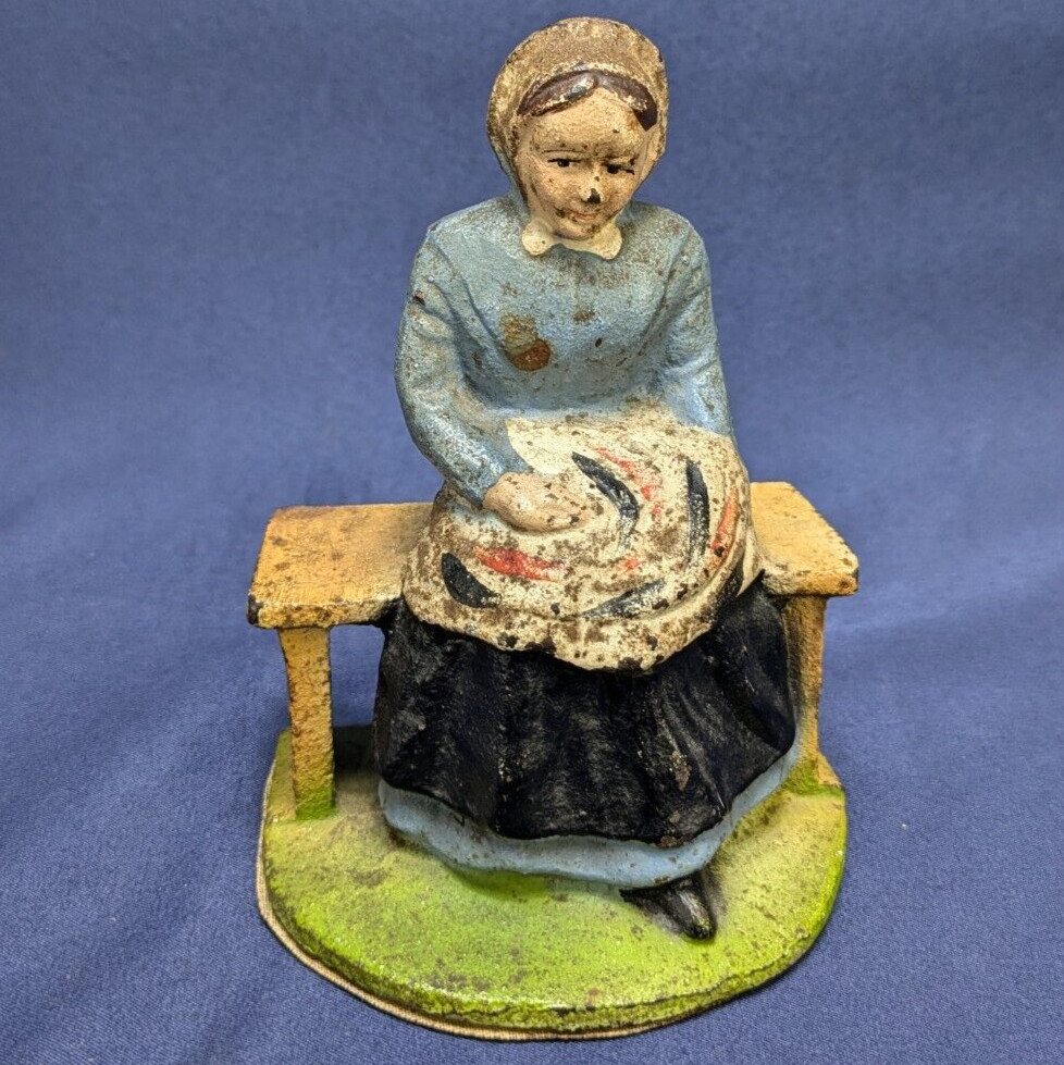 Vintage Cast Iron Figurine of Woman on Bench – Hand-Painted, Early 20th Century