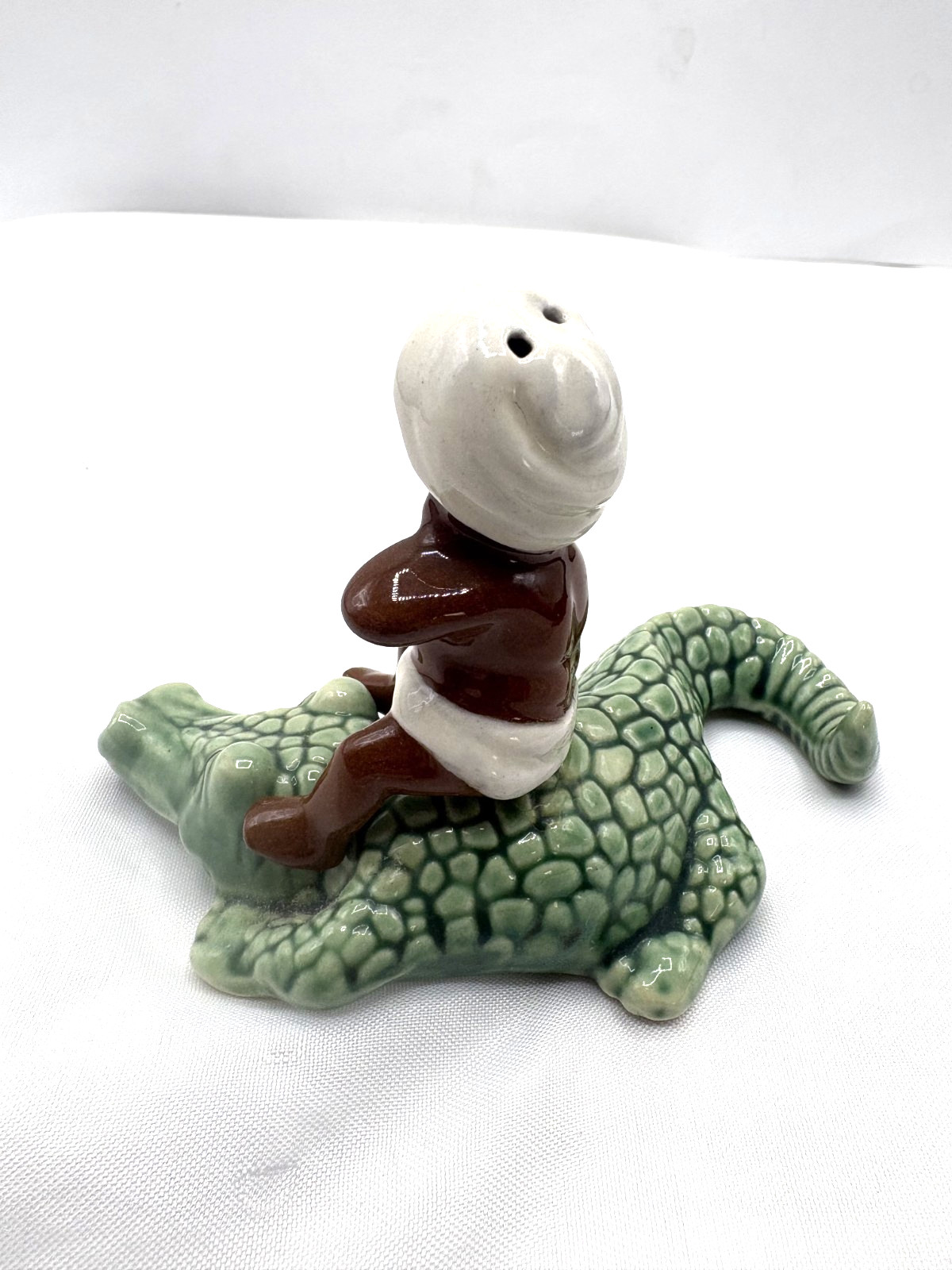 Ceramic arts Studio 50’s shaker/figurine Alligator & Native boy #1
