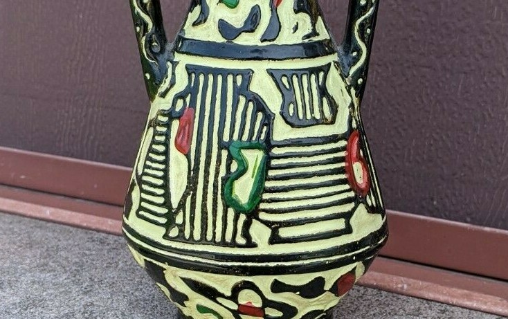 Tribal look small vintage chalkware jug in gold red black green 6″ h, 3 3/4″w