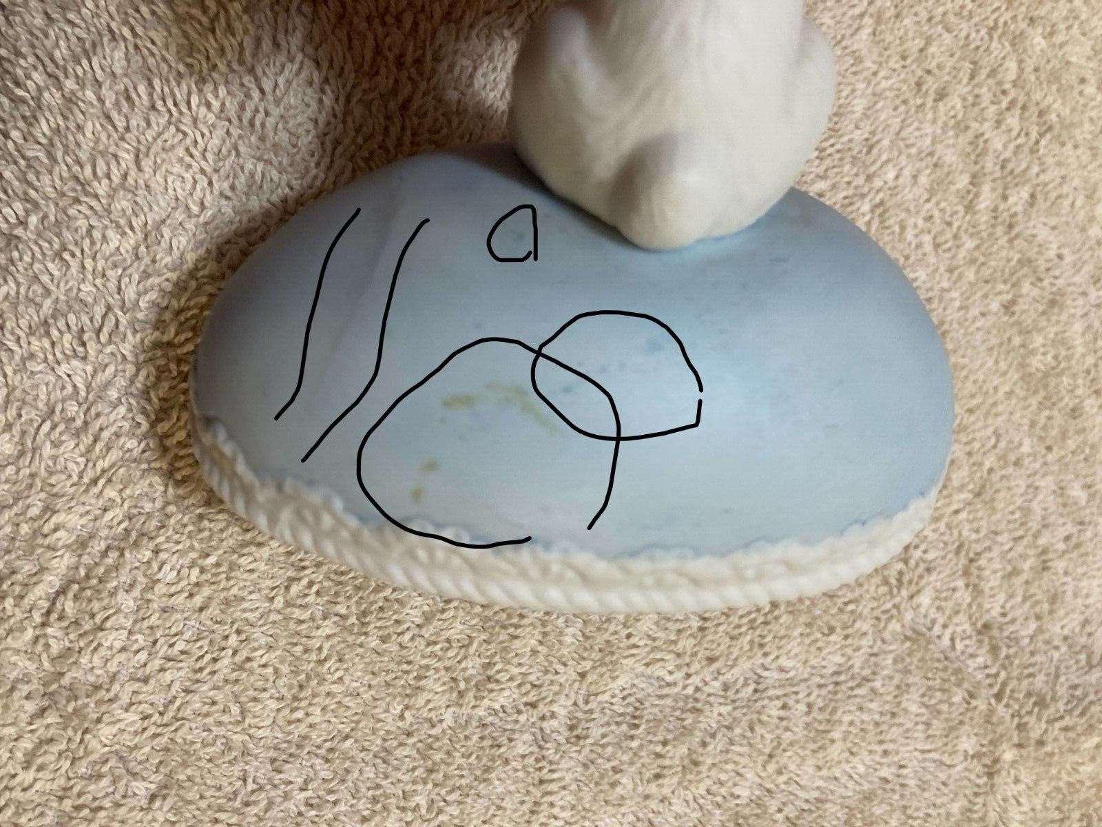 White Rabbit Holding onto Yellow +Green Egg 2 piece Egg that is Blue (Flawed)