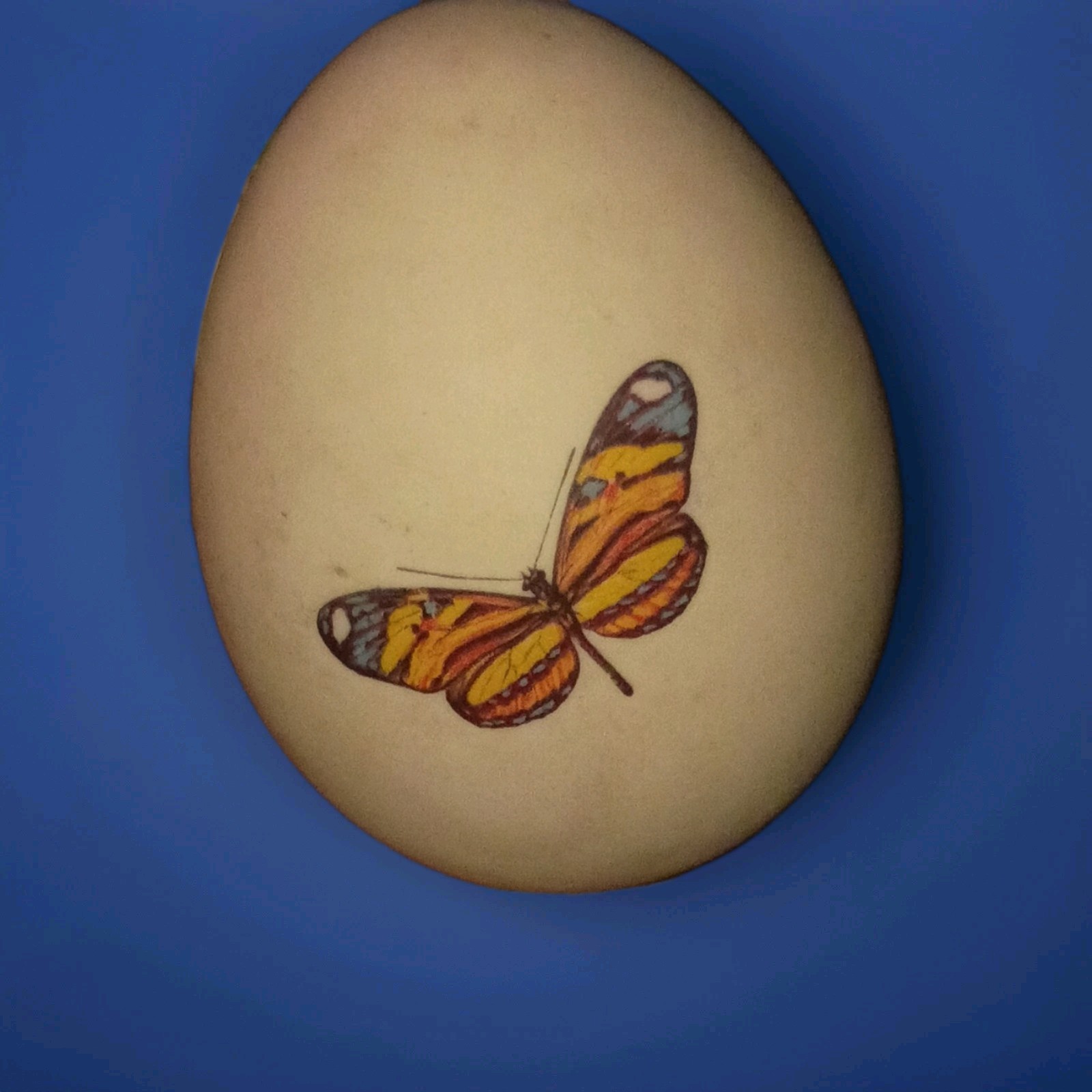 Painted Ceramic Collector Egg Figurine, Beige Multicolor Butterfly Design