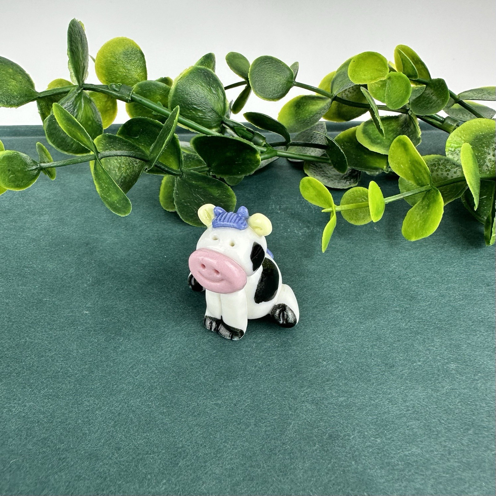 Vintage Mini Black And White Cow Figurine Sitting