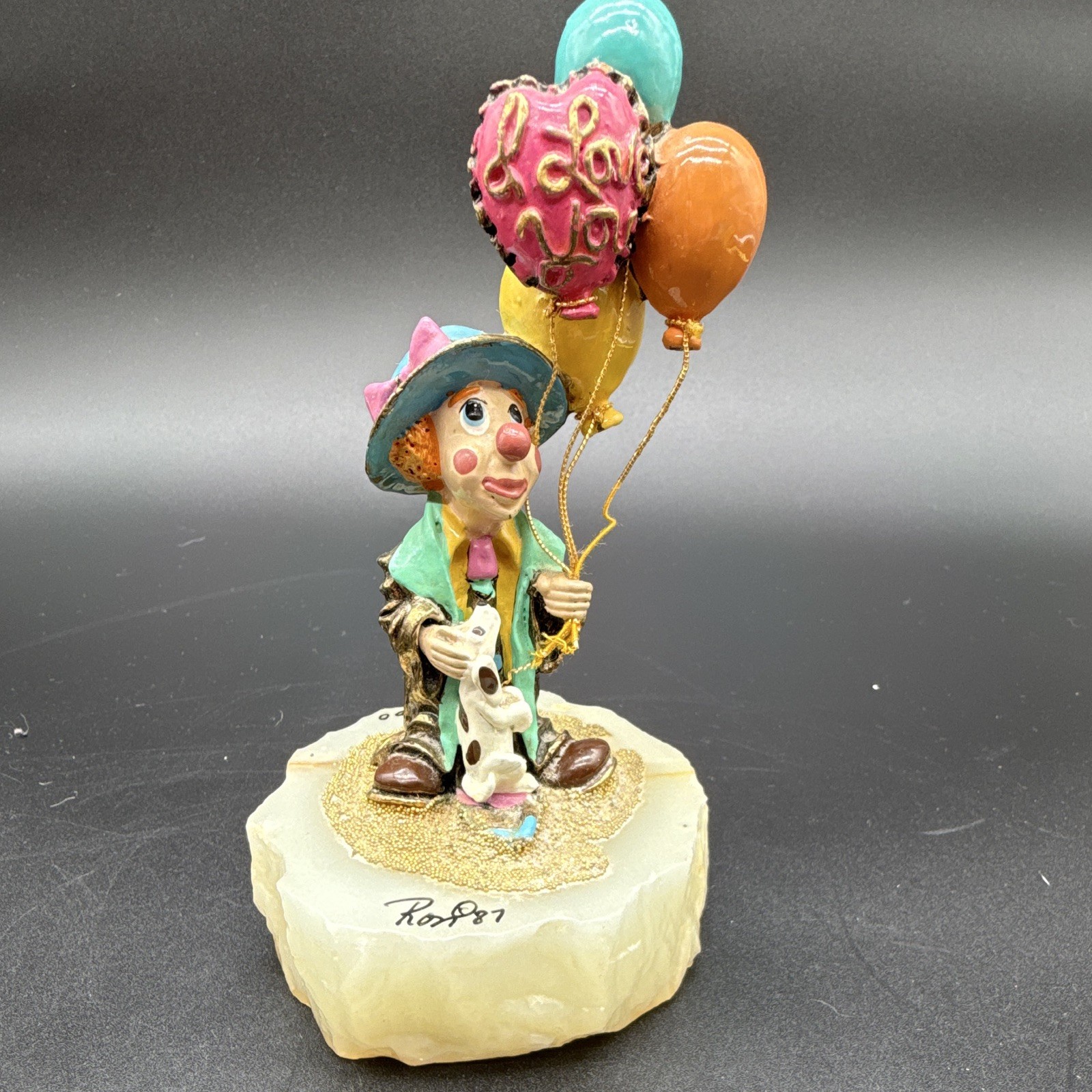 Ron Lee signed hand-painted clown figurine with balloons on stone base, 1987