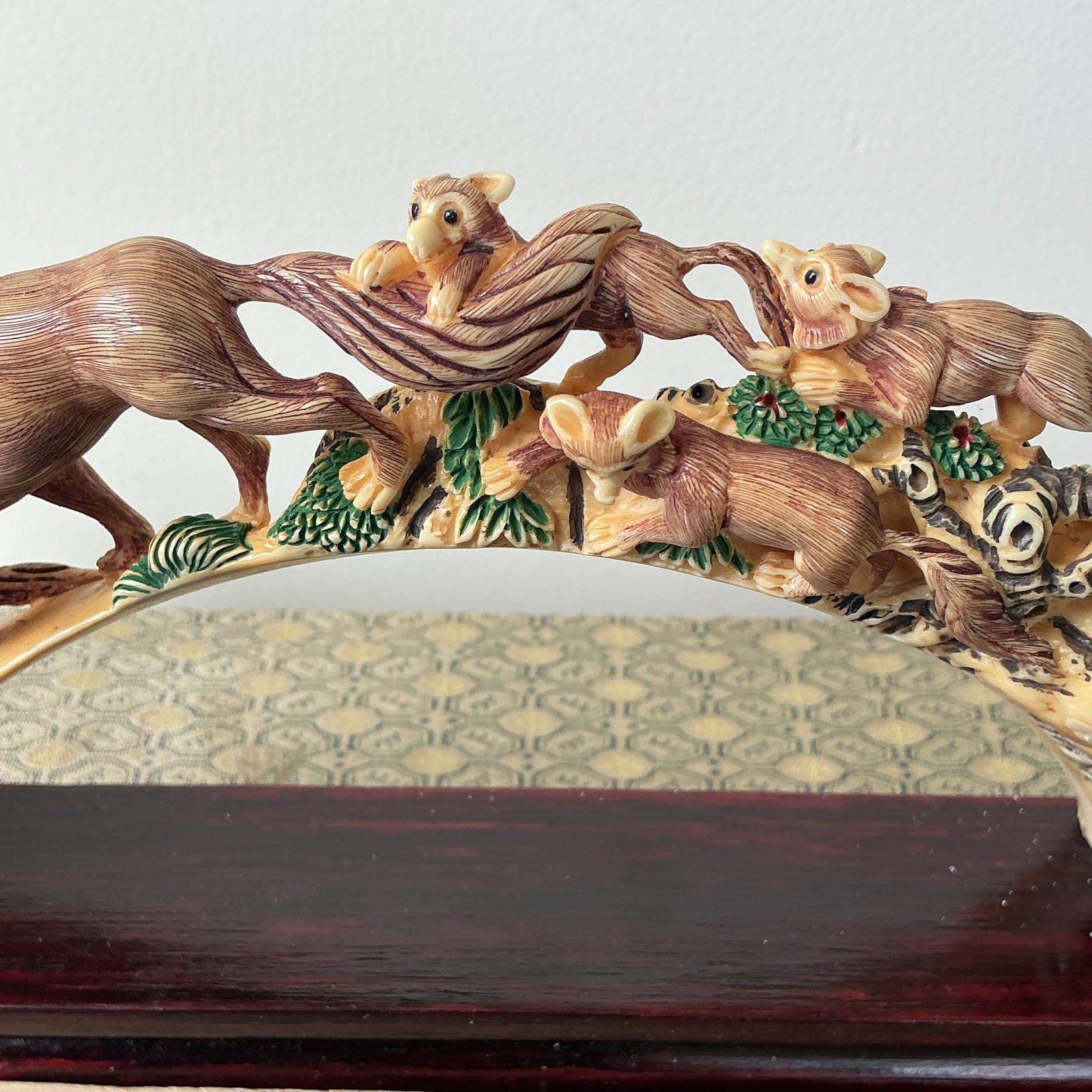 Ivory color Group animal Arch Sculpture on Dark Wood Base Brown Beige Green