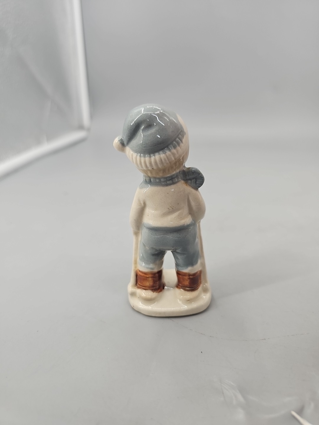 Vintage Ceramic Porcelain Skiing Boy Figurine Winter Snowshoes