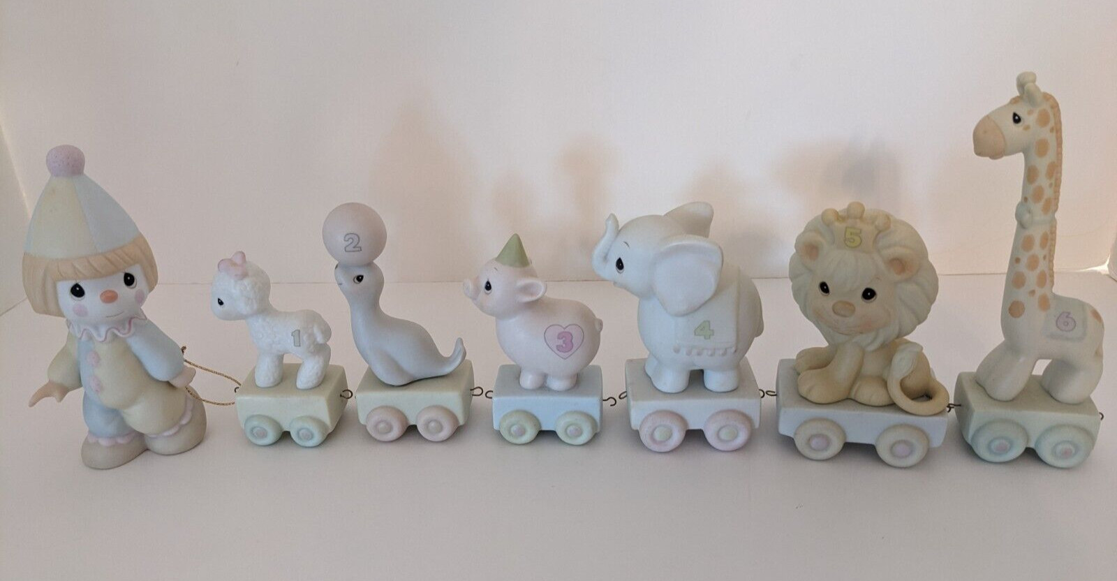 Precious Moments Birthday Train Series Ages 1 – 6 and Conductor Clown – 7 Pieces