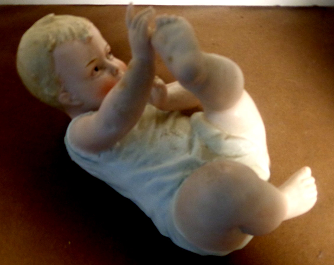 Vintage Heubach Bisque Reclining 8″ Piano Baby Figurine No.3102