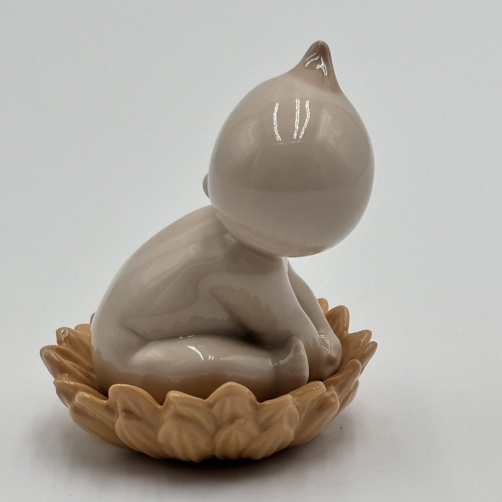 NAO By Lladro 2003 Where do babies come from…Sunflower Porcelain Baby Figurine