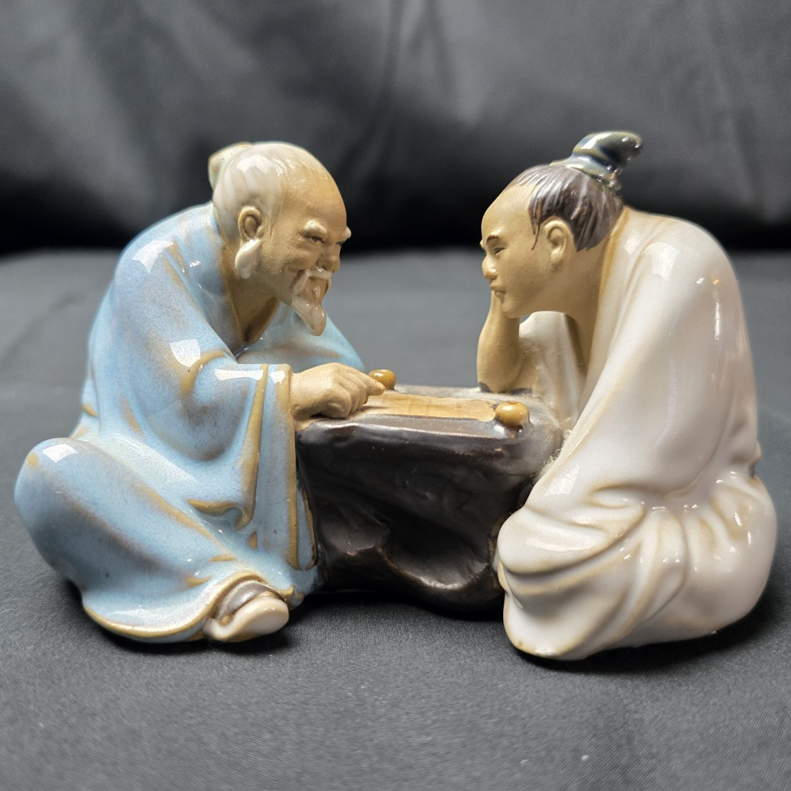 Ceramic Men Playing Board Game Figurine Glossy Blue White Black Tan Asian