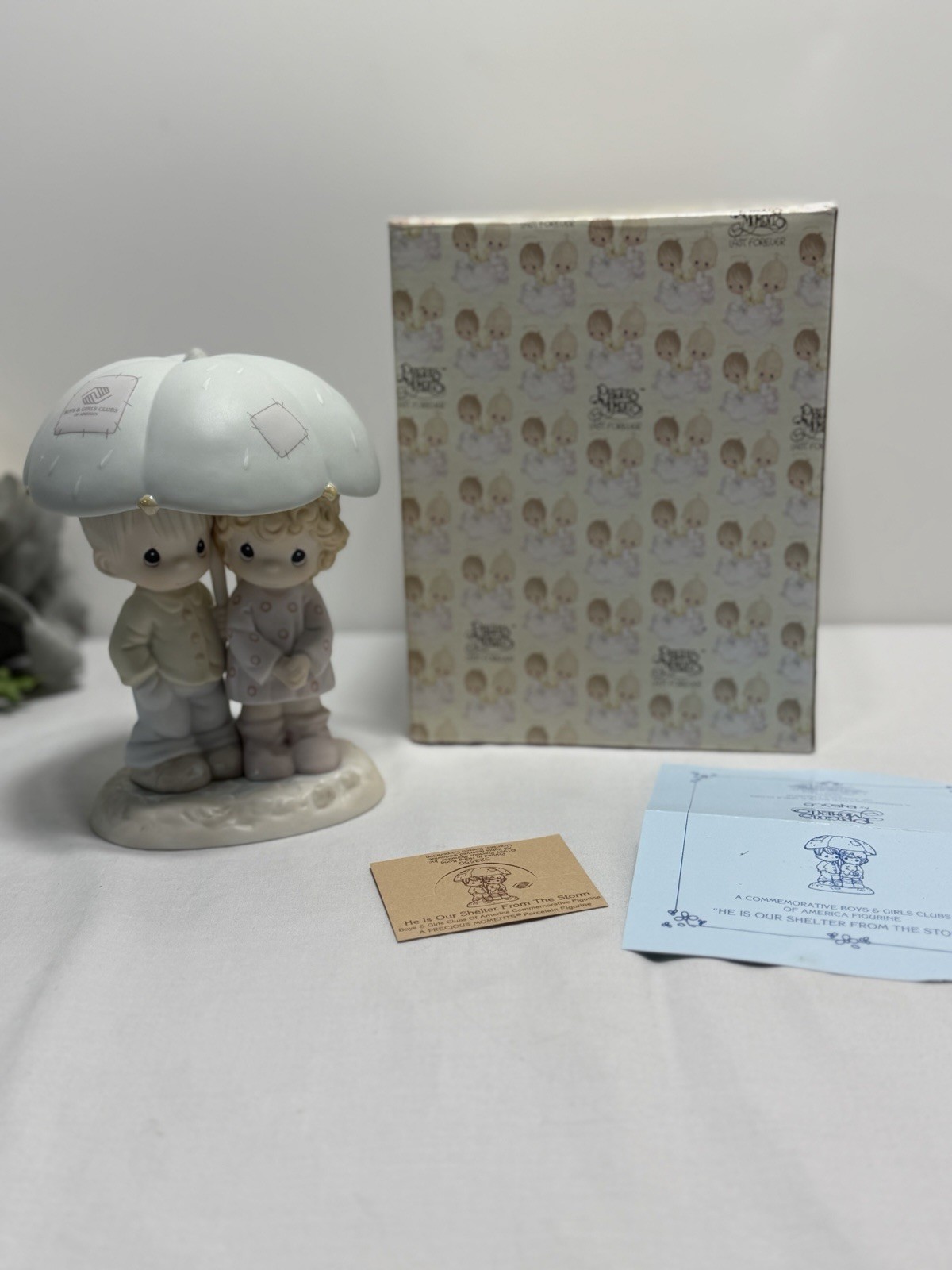 Enesco Precious Moments 523550 “He Is Our Shelter From The Storm”