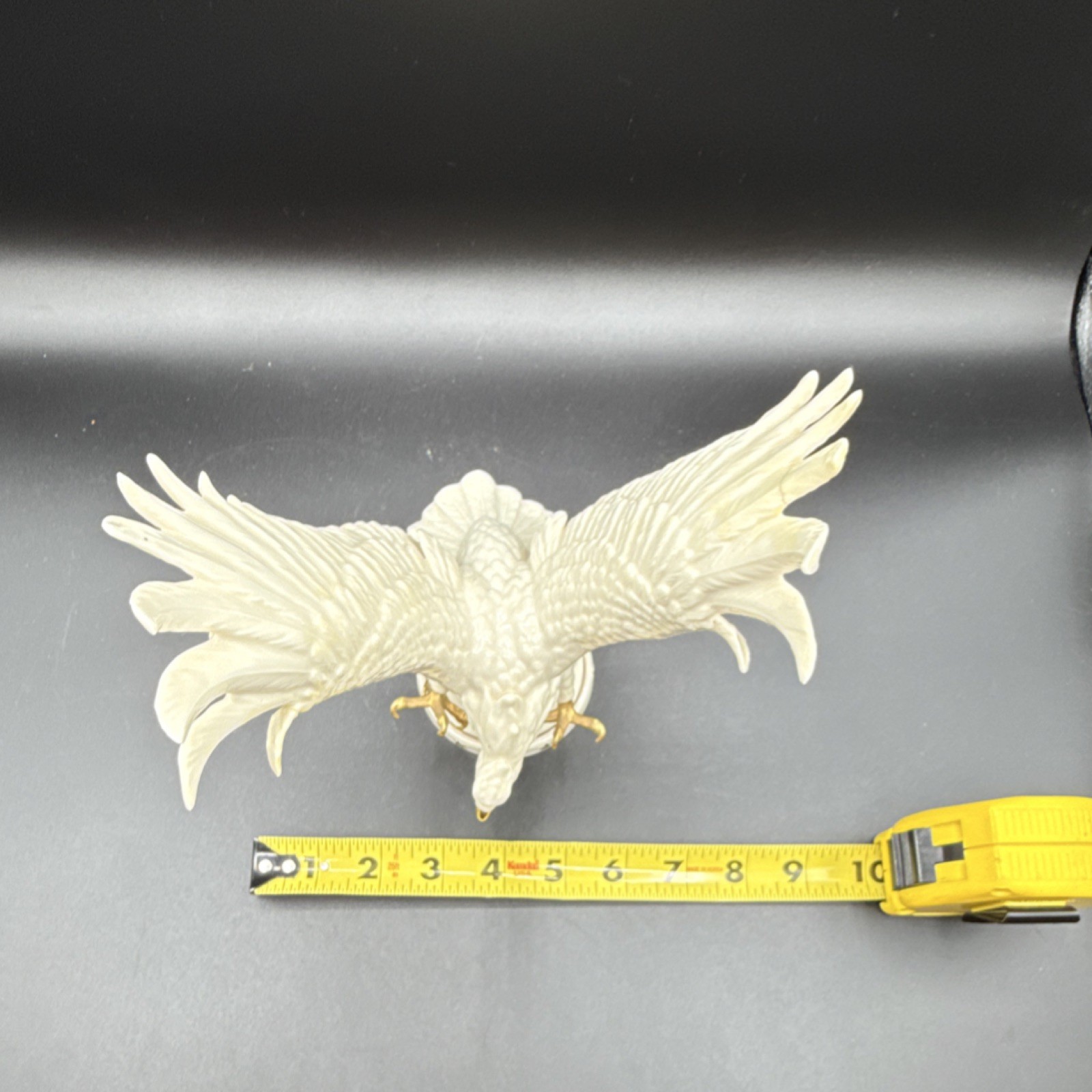 Lenox ivory and gold porcelain eagle figurine with glossy finish, 9 in