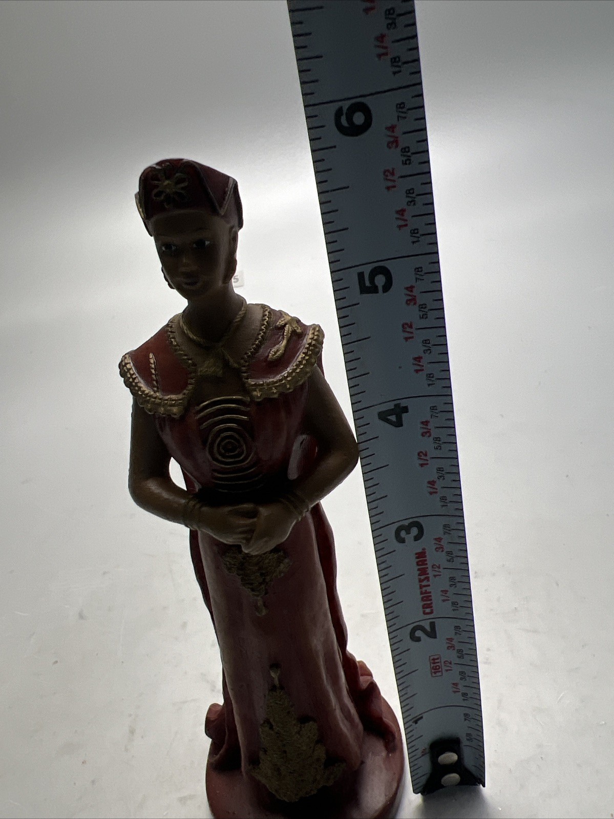 African Woman Figurine in Brown and Gold Dress 1980 S
