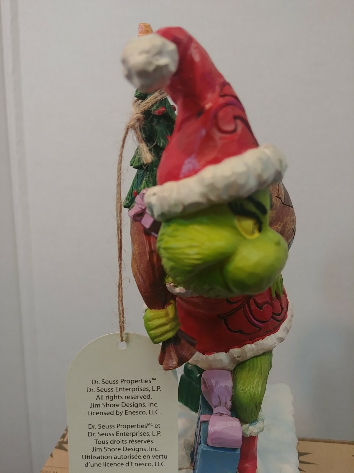 Dr. Seuss Grinch by Jim Shore Grinch Tip Toeing with Bag of Gifts 7.7″ Figurine