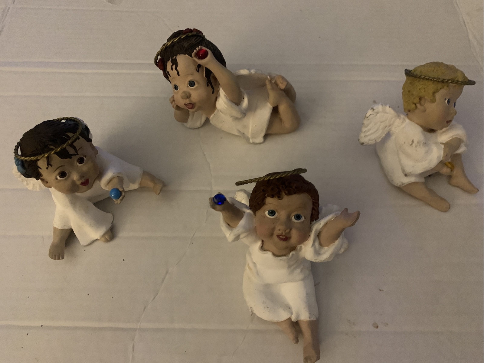 4 Vtg Ethnic ceramic Angel Sandy Doll figurines Birthstone July Dec. Nov Sept