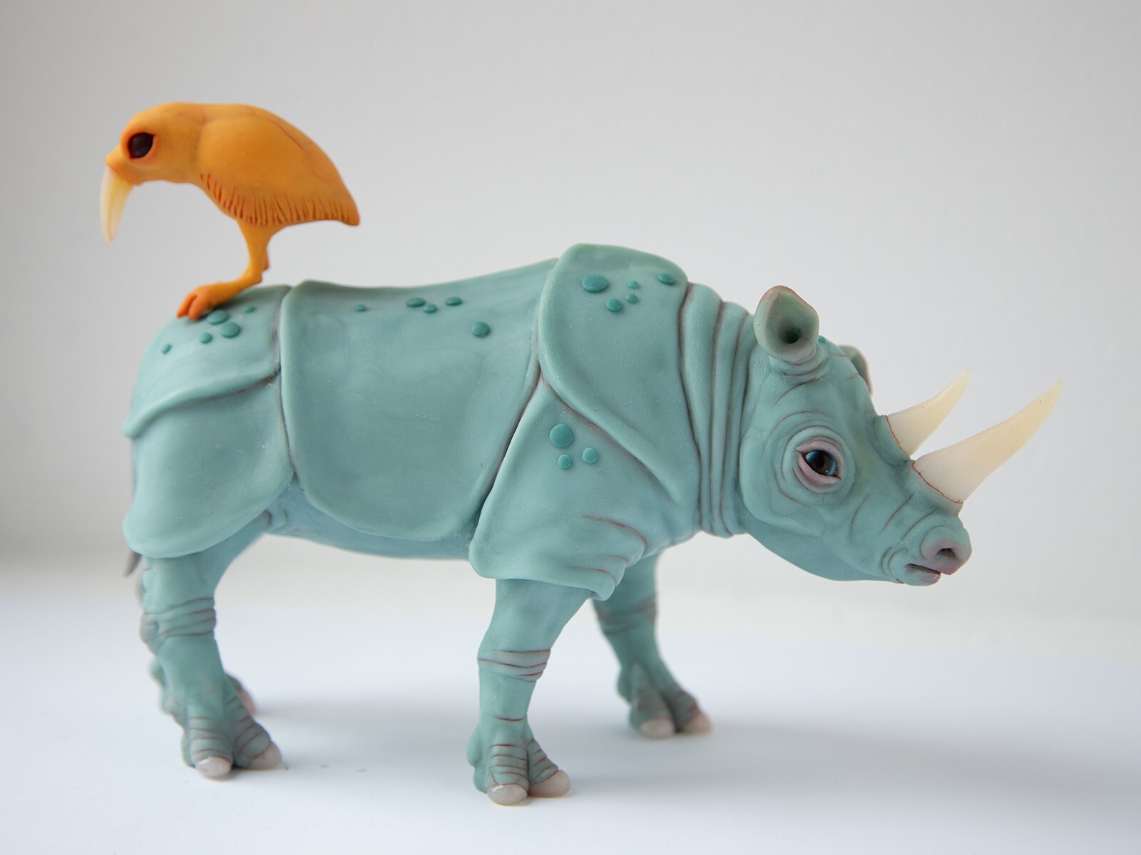 Perfect marriage – weird sculpture gift for couple, rhino and bird family statue
