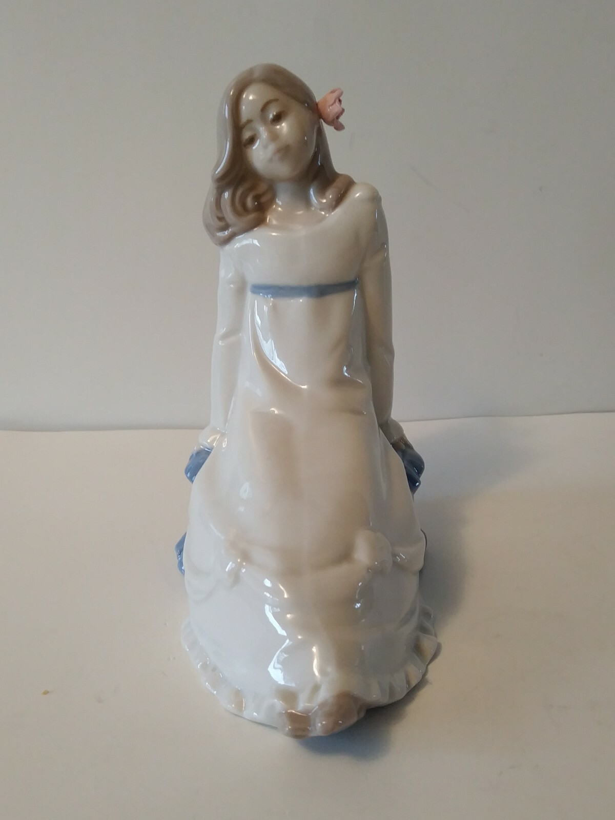 Enrique Nadal Porcelain Girl Sitting on a Cushion Figurine 1987 Excellent shape.